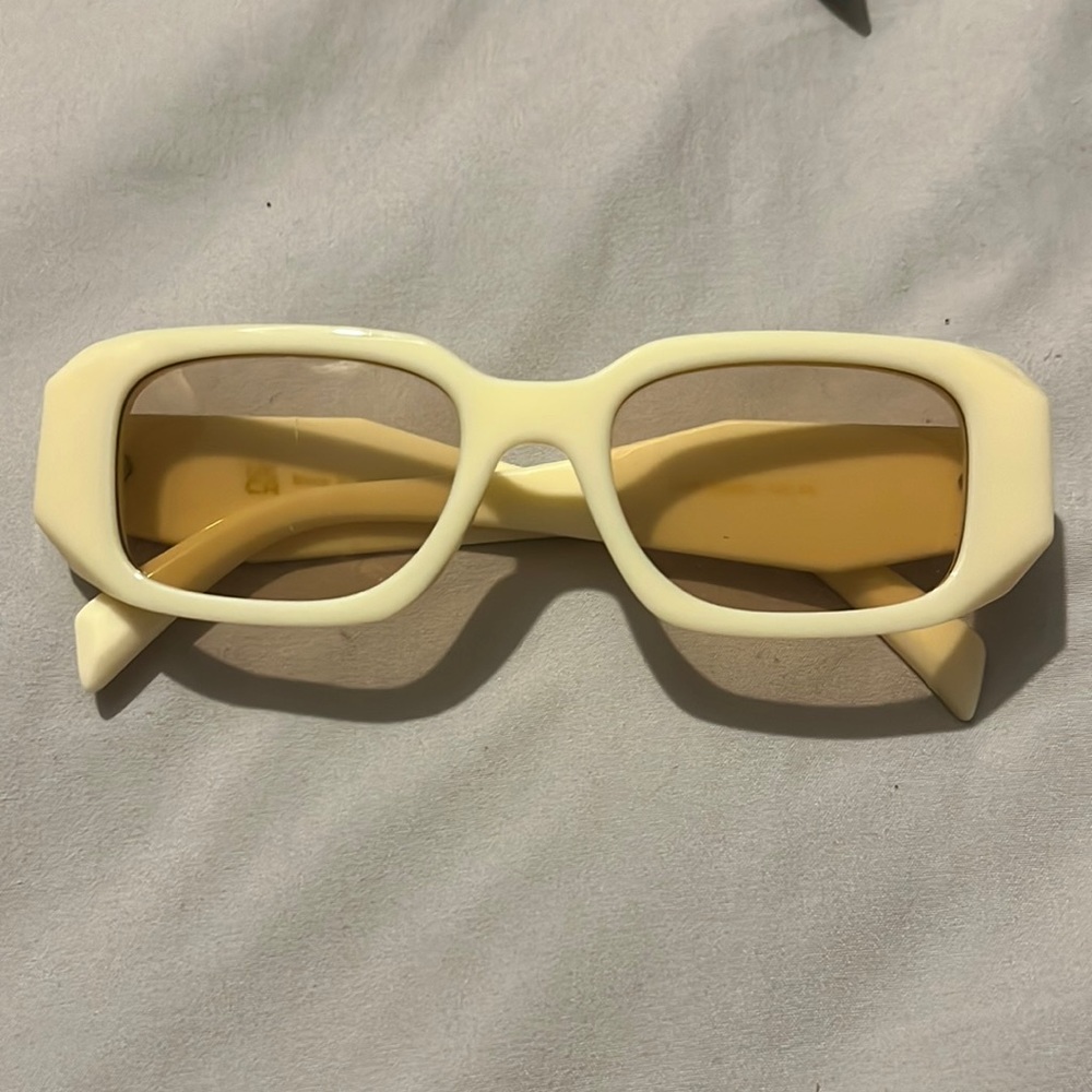 Cream colored sunglasses